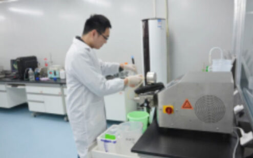 Technician working at laboratory instruments
